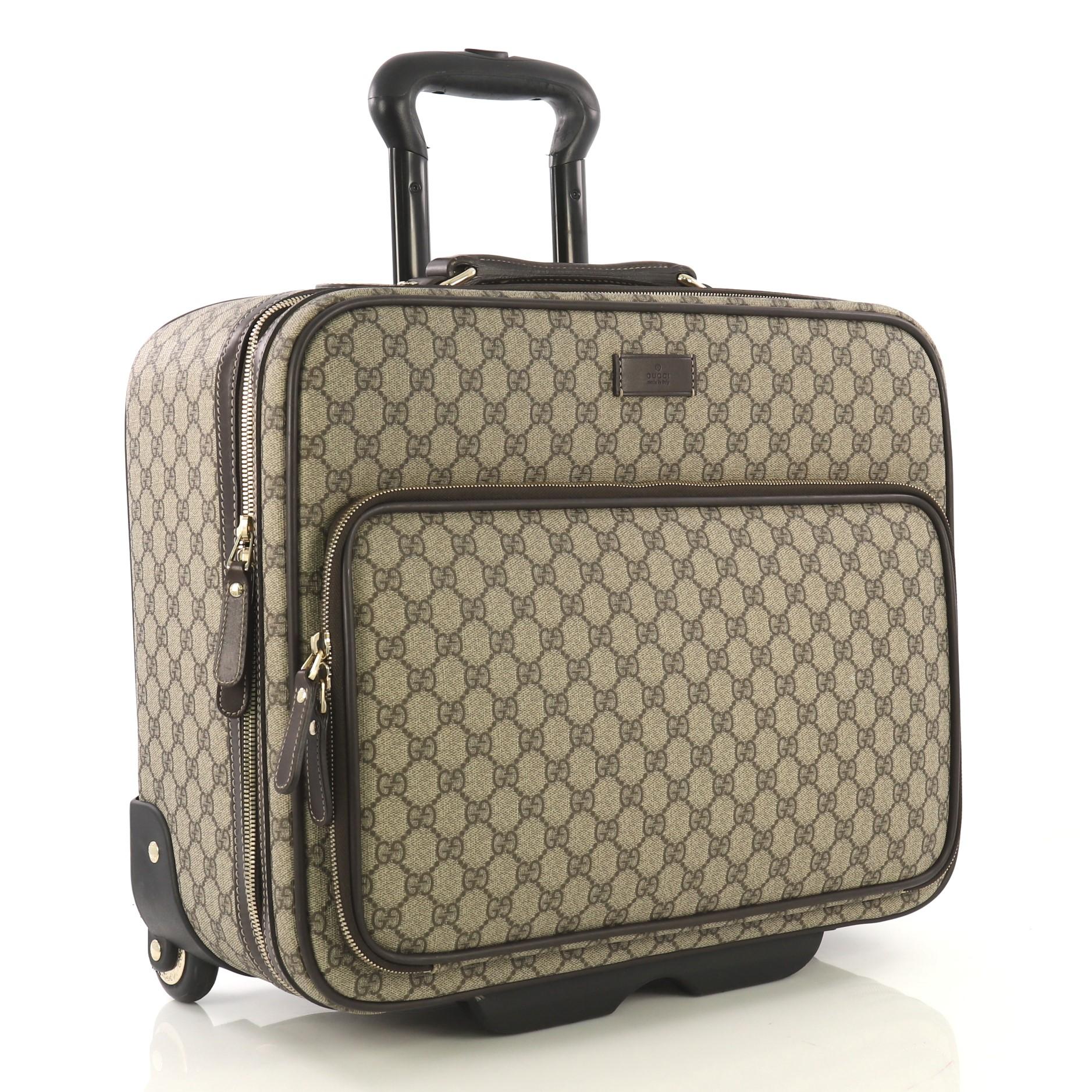 gucci rolling luggage
