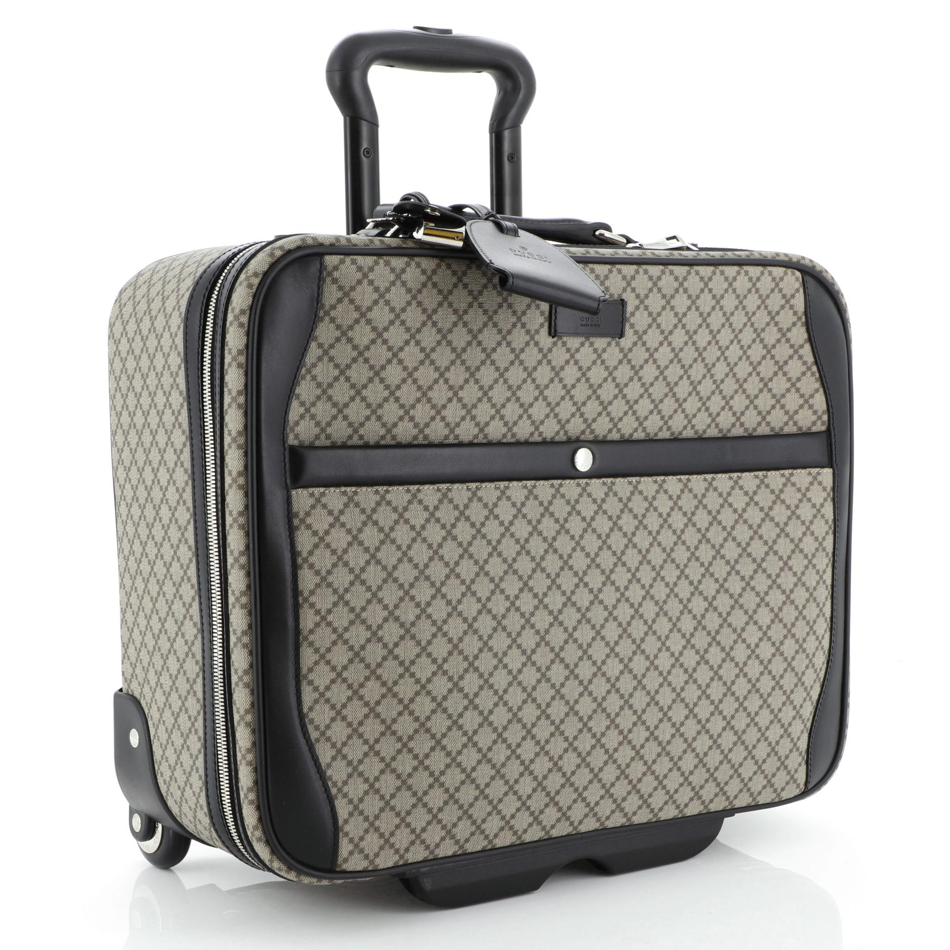 Gucci Carry On Trolley Rolling Luggage GG Coated Canvas With Leather at  1stDibs | gucci trolley, gucci rolling luggage, canvas leather luggage