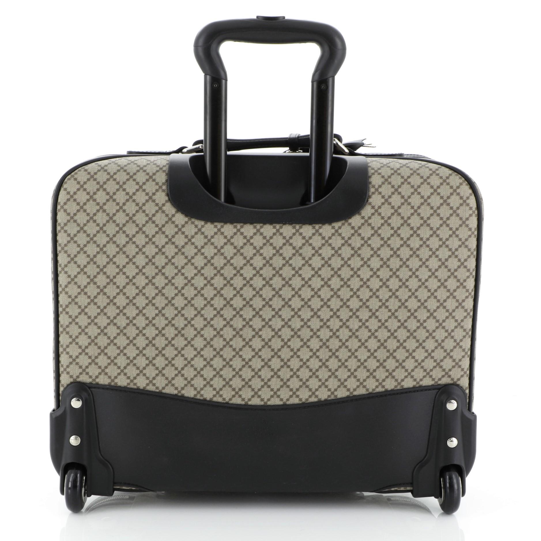 gucci rolling luggage