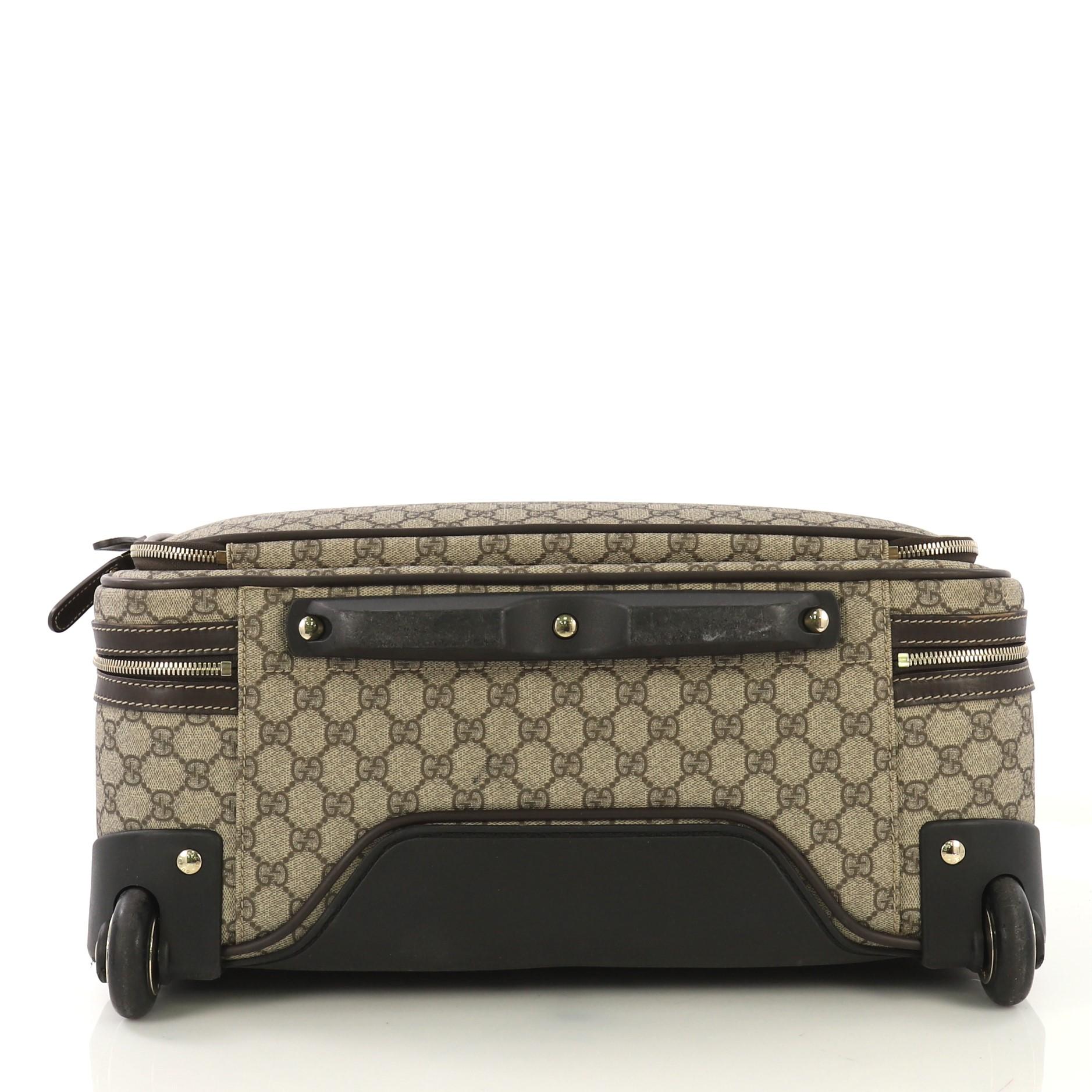 gucci luggage with wheels