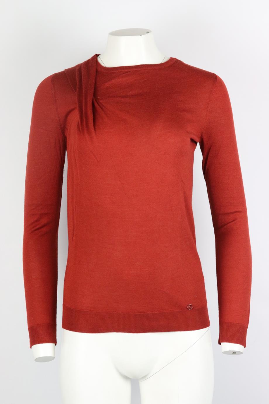 Gucci cashmere and wool blend sweater. Red. Long sleeve, crewneck. Slips on. Size: Medium (UK 10, US 6, FR 38, IT 42). Bust: 33.6 in. Waist: 30.2 in. Hips: 30.4 in. Length: 24.7 in. Very good condition - Composition label cut out for comfort; see