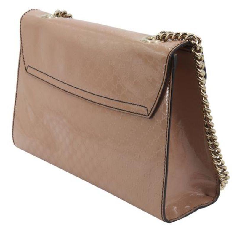 beige patent leather purse