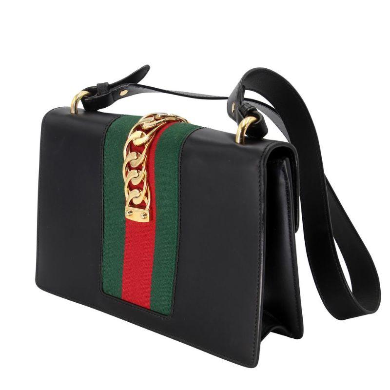 gucci black bag with red and green strap