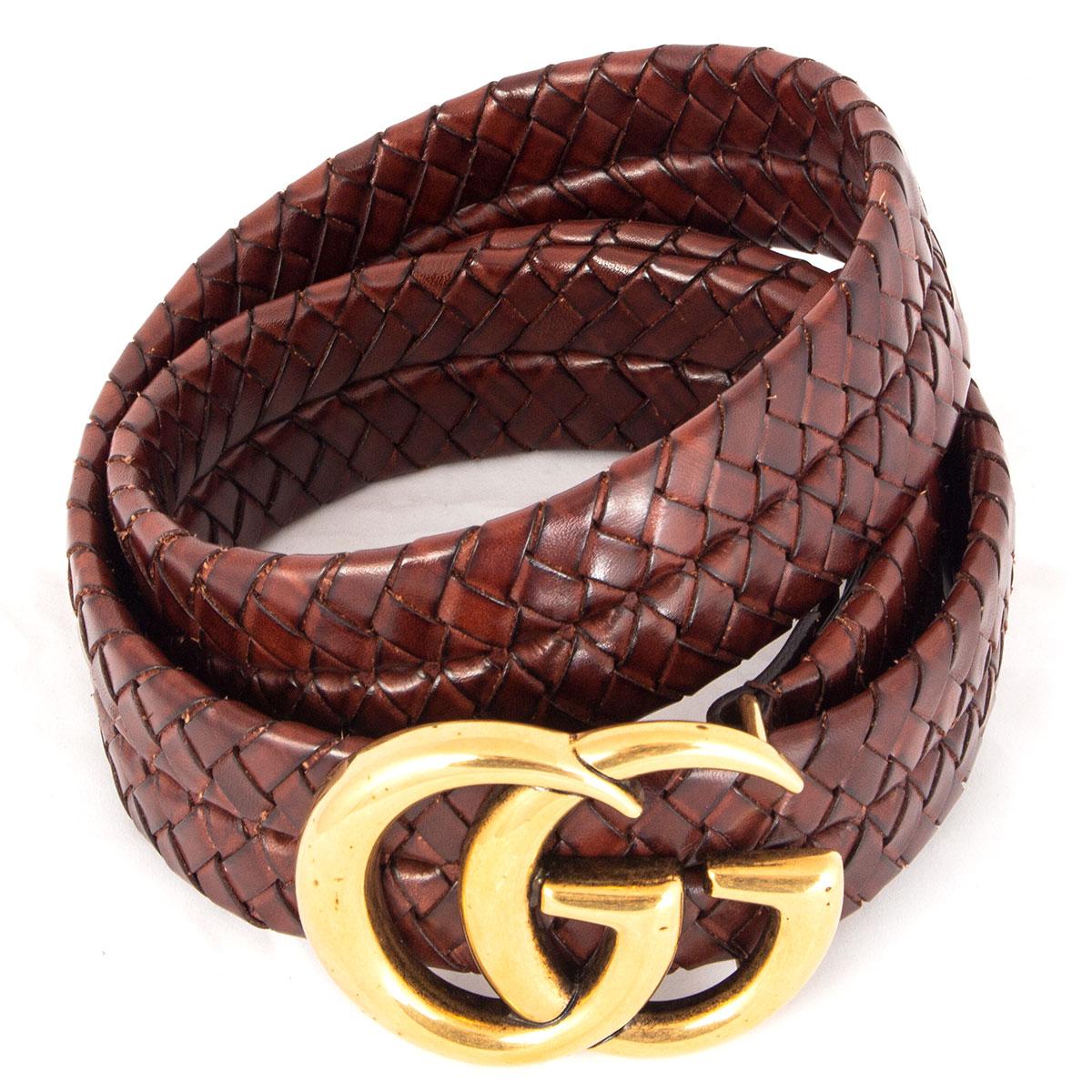 100% authentic Gucci braided GG belt in brown leather featuring antique gold-tone hardware. Has been worn and is in excellent condition. 

Measurements
Tag Size	80
Size	80cm (31.2in)
Width	4cm (1.6in)
Length	104cm (40.6in)
Buckle Size Height	6cm