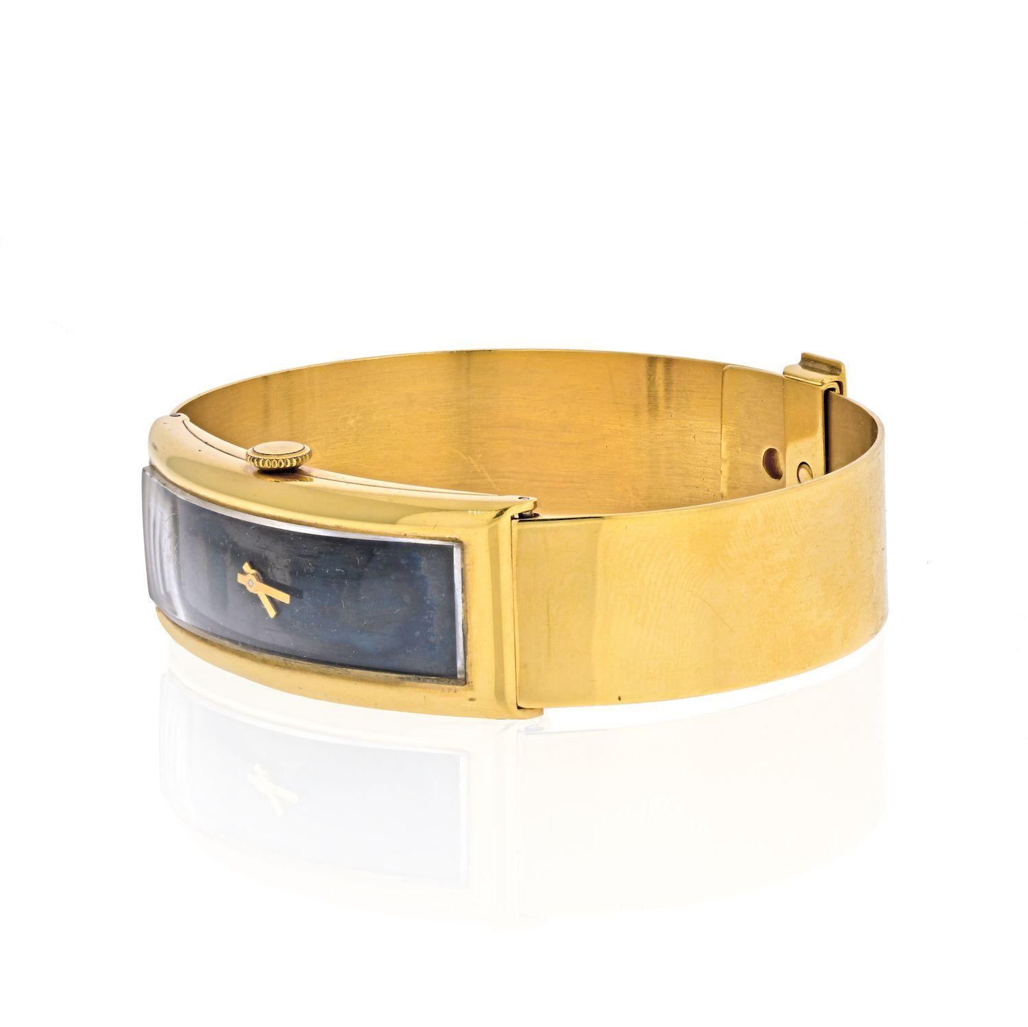Gucci Circa 1970's 18K Yellow Gold Vintage Rectangular Watch. Up to wrist size 7.5 inches. 
