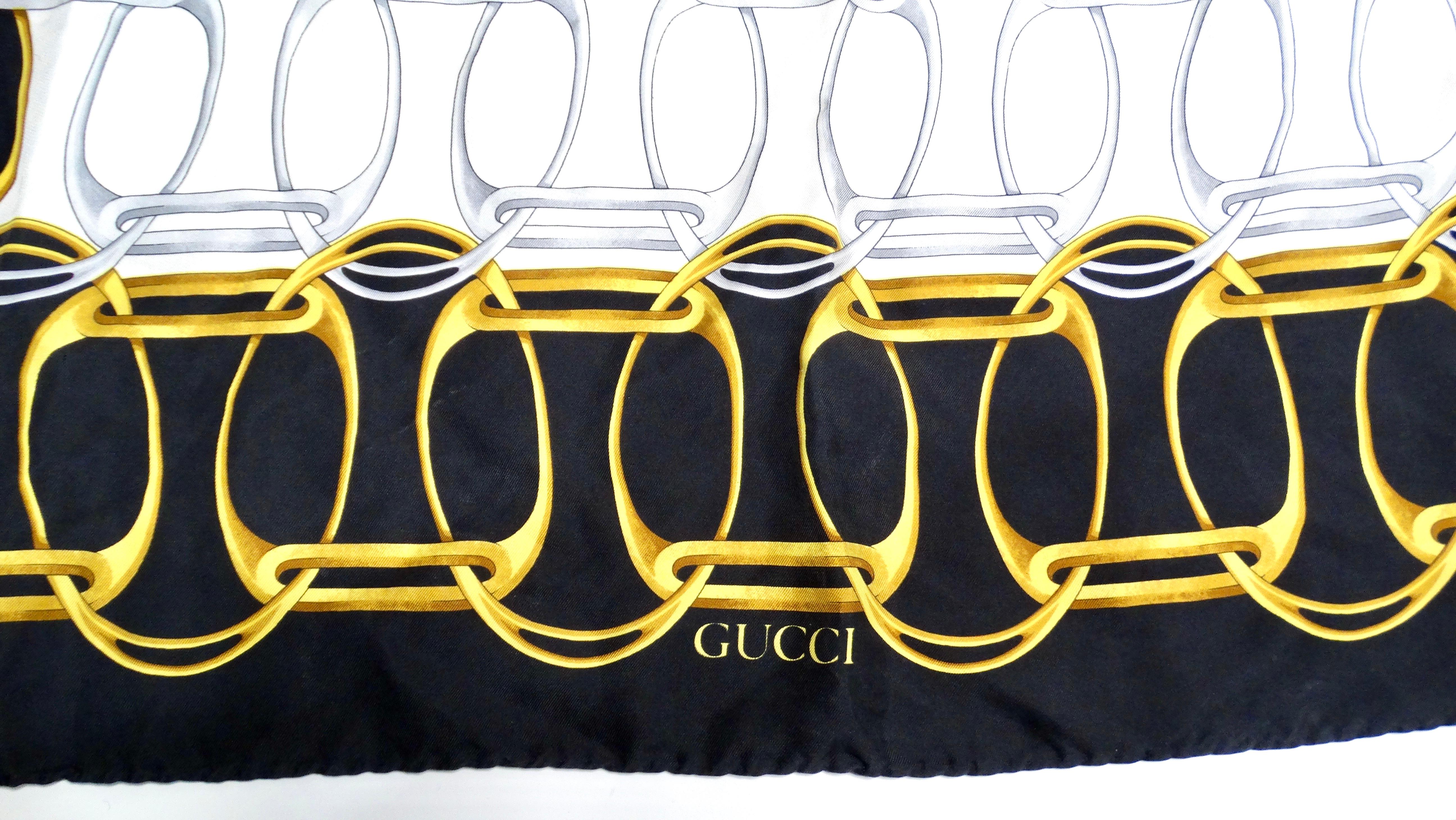Discover timeless elegance with this Gucci Circa 1990s Silk Chain Link Motif Scarf, a stunning accessory that embodies the sophistication of vintage high fashion. Featuring an intricate chain link design in sophisticated hues of black, white, grey,