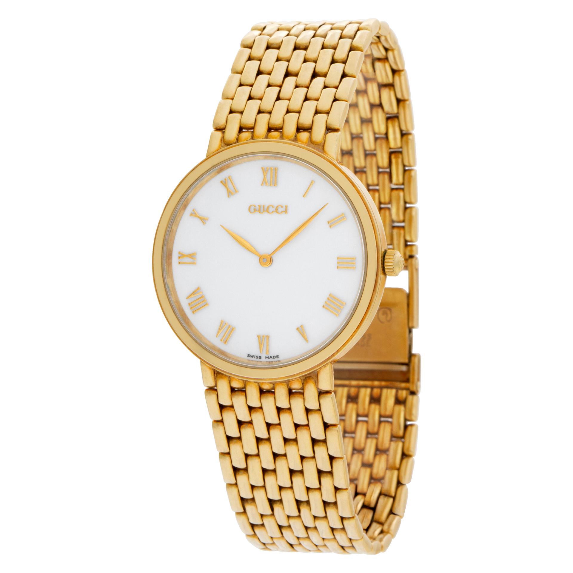 Gucci in 18k yellow gold on an 18k mesh bracelet. Fits a 7.25 inch wrist. Quartz. Ref 701M. 33mm case size. Circa 2000s. Fine Pre-owned Gucci Watch. Certified preowned Classic Gucci Classic 701M watch is made out of yellow gold on a 18k bracelet