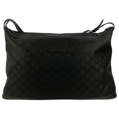 GUCCI “Microguccissima” Black Embossed Leather Zip Cosmetic Toiletry Travel  Bag at 1stDibs