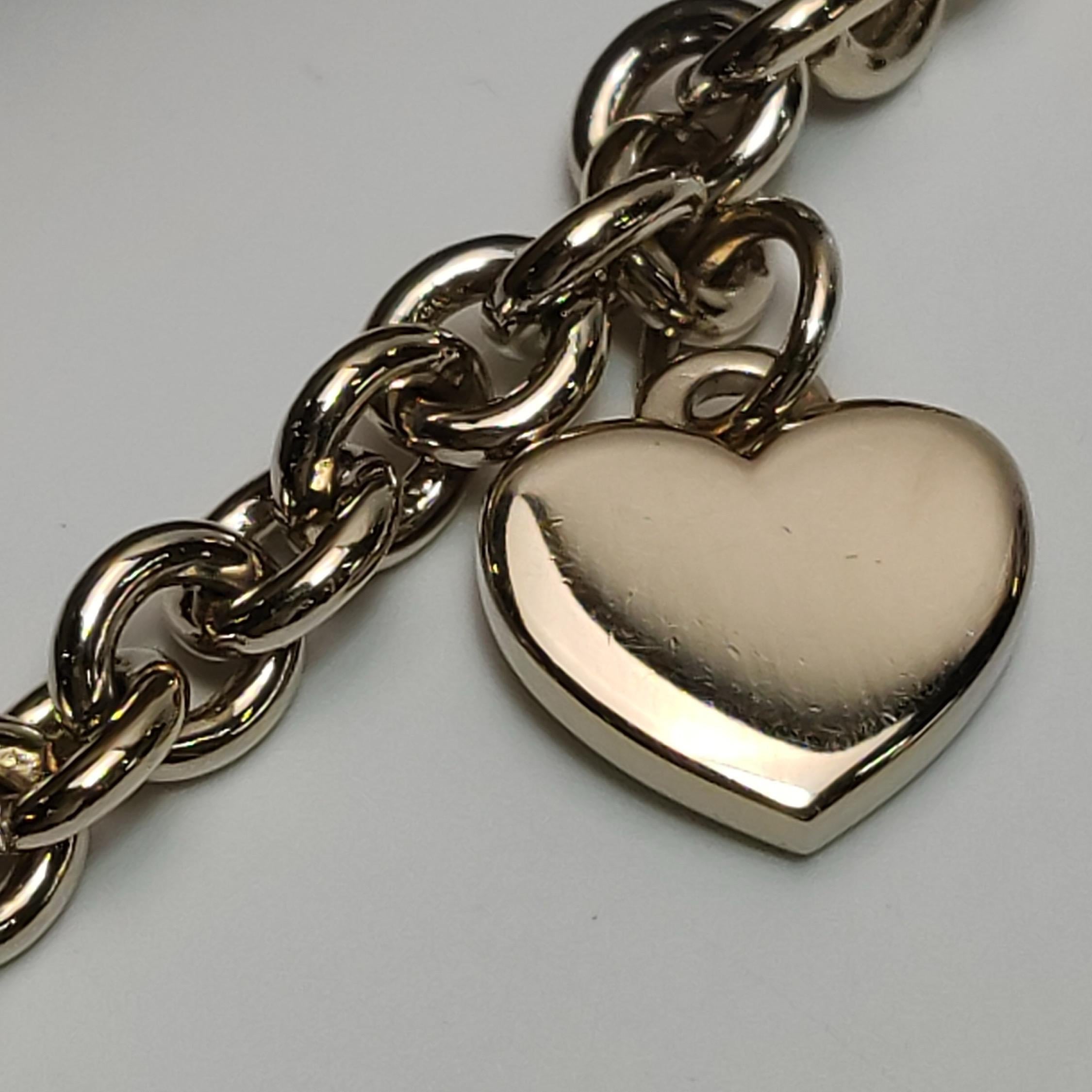 Gucci Pochette Monogramme en cuir doré Chaîne en forme de cœur en vente 6