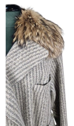 Gucci coat with fox fur collar.