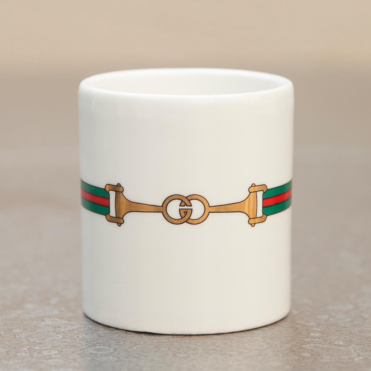 Drink your coffee on an elegant way, with this very rare Gucci coffee pot from the 1970s.



  