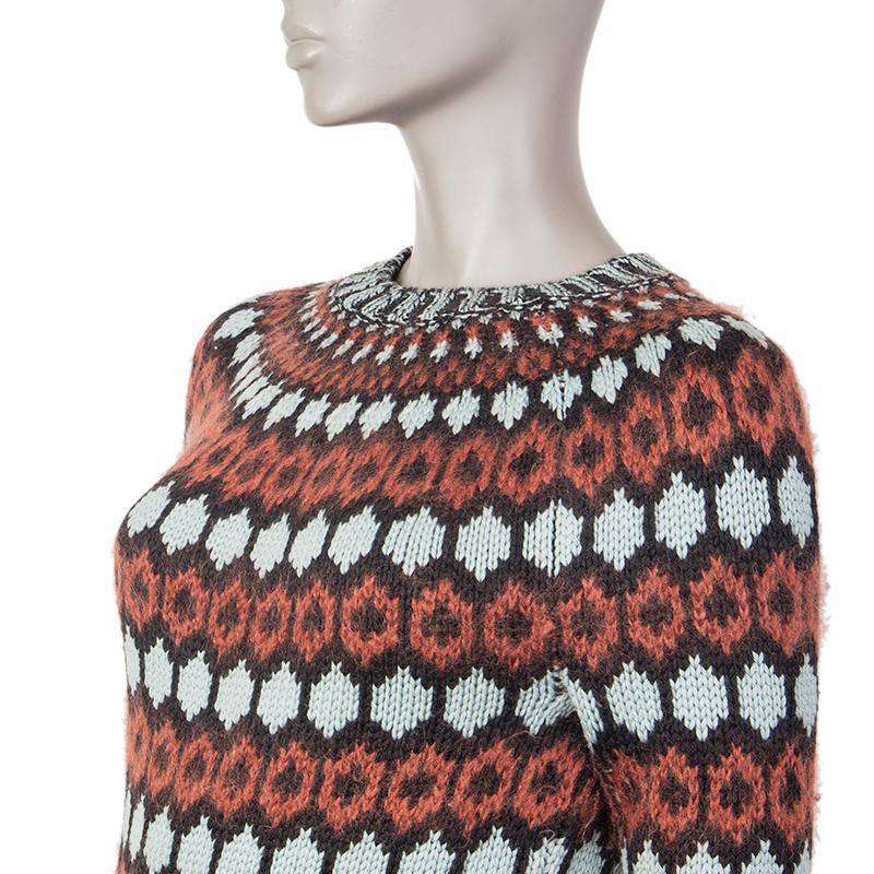 Gucci beehive-print sweater in black, pale blue and cognac wool (88%), mohair (8%), and nylon (4%) with a crew neck. Unlined. Has been worn and is in excellent condition.

Tag Size S
Size S
Shoulder Width 35cm (13.7in)
Bust 88cm (34.3in) to 98cm