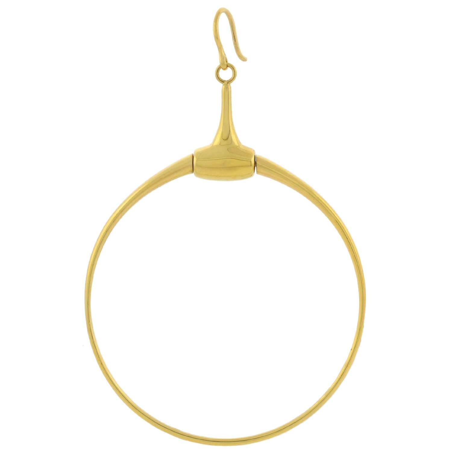 A fabulous pair of Estate horse bit earrings from legendary fashion house Gucci! These stylish earrings are crafted in vibrant 18kt yellow gold and have a wonderful equestrian flair with a wearable everyday appeal. A unique twist on a classic hoop