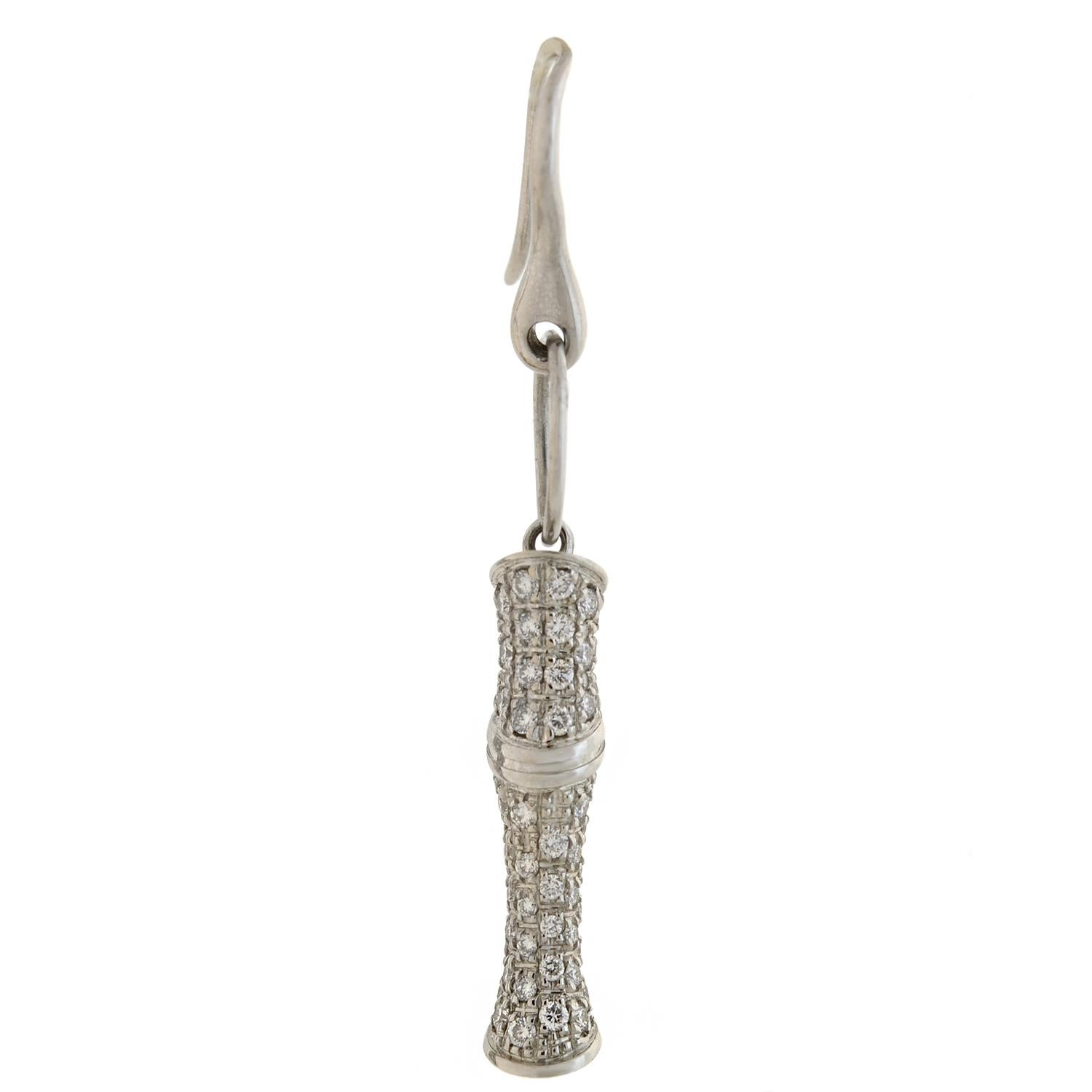 A stylish pair of estate Gucci earrings! Crafted in 18kt white gold, each earring has a 3-dimensional bamboo motif, completely encrusted with sparkling pavé diamonds. White gold wires and jump rings are attached to the top, allowing the bamboo