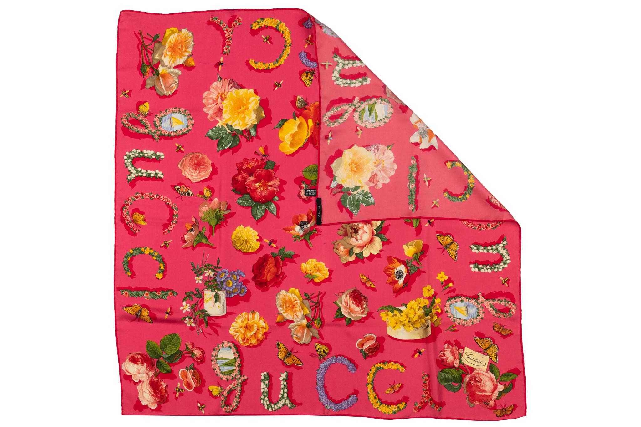 Gucci coral silk scarf with multicolor flowers. Hand rolled edges. 
Please refer to photos for minor stains.