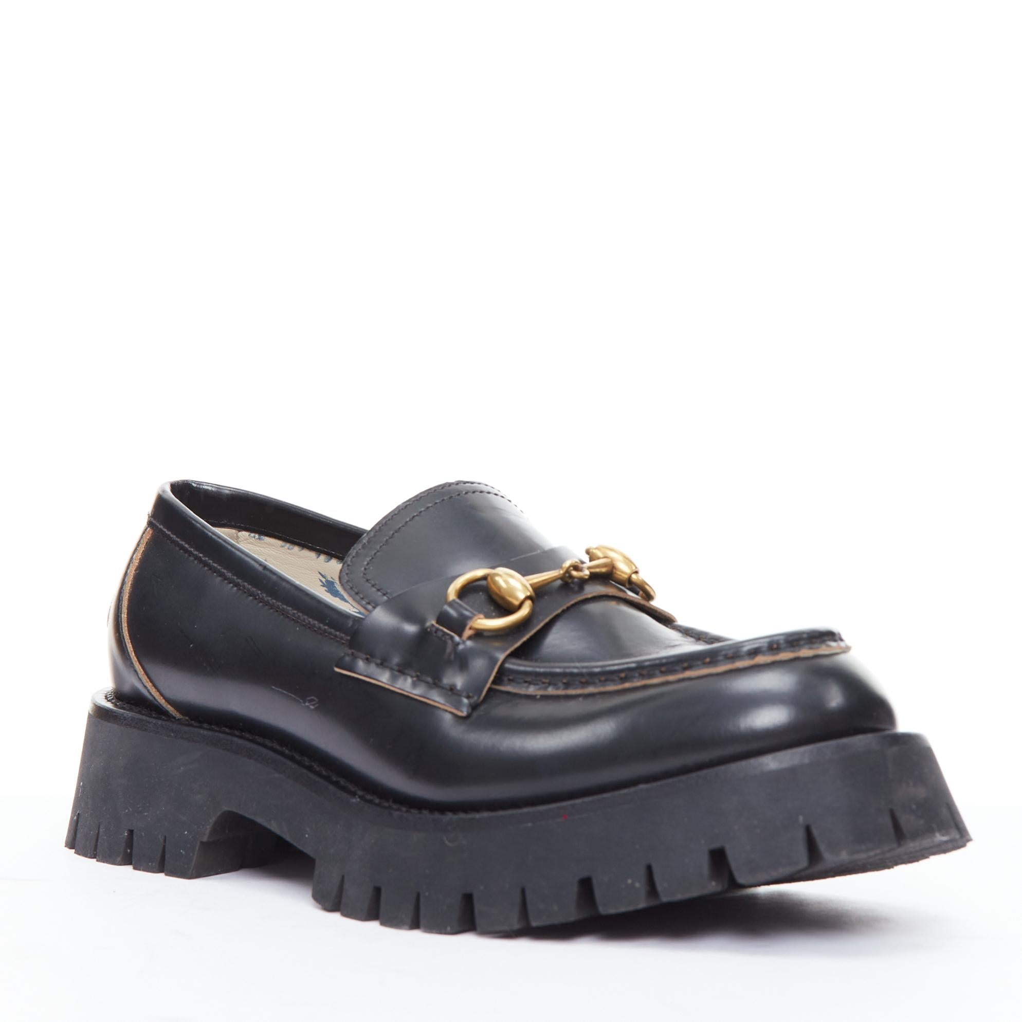 GUCCI Cordovan Lux Lug Sole black gold horsebit loafers EU38
Reference: ECLO/A00089
Brand: Gucci
Designer: Alessandro Michele
Model: Cordovan Lux
Material: Leather
Color: Black, Gold
Pattern: Solid
Closure: Slip On
Lining: Cream Leather
Extra