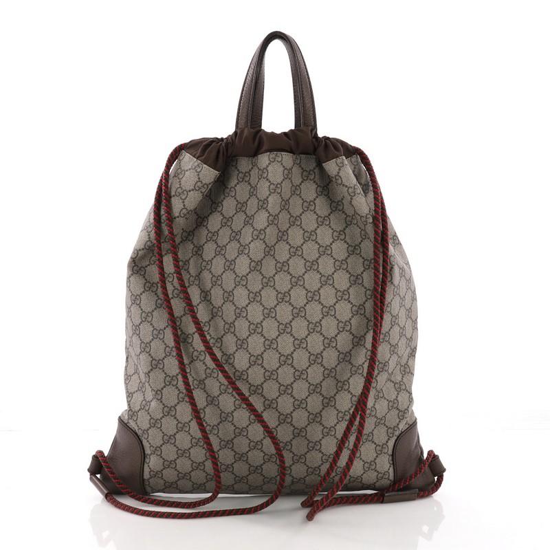 Gucci Courrier Soft Drawstring Backpack GG Coated Canvas with Applique Medium In Good Condition In NY, NY