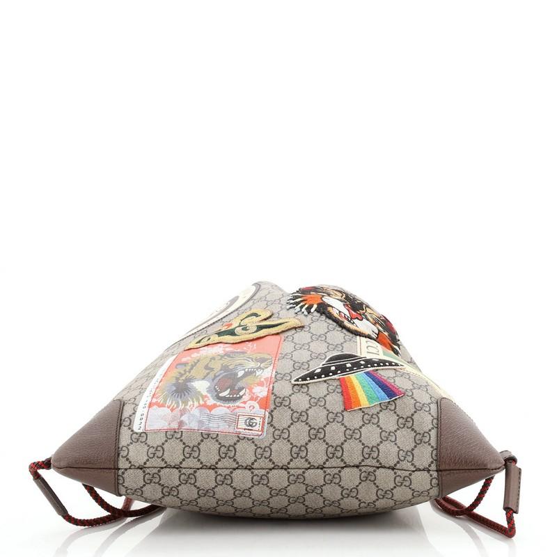 Gucci Courrier Soft Drawstring Backpack GG Coated Canvas with Applique Medium In Good Condition In NY, NY