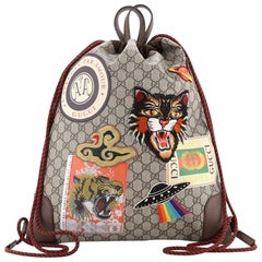 Gucci Courrier Soft Drawstring Backpack GG Coated Canvas with Applique Medium