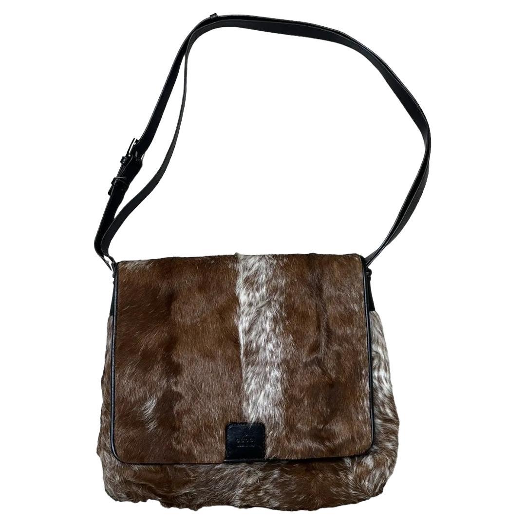 Sac messager en cuir de vachette Gucci en vente