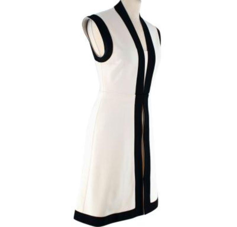 Gucci Cream & Black Sleeveless Stretch Lace Mini Dress

- A-line fit
- Sleeveless. 
- Cream dress with black trim.

Made in Italy.
No care label.
Condition 9.5/10. Fantastic condition

PLEASE NOTE, THESE ITEMS ARE PRE-OWNED AND MAY SHOW SIGNS OF