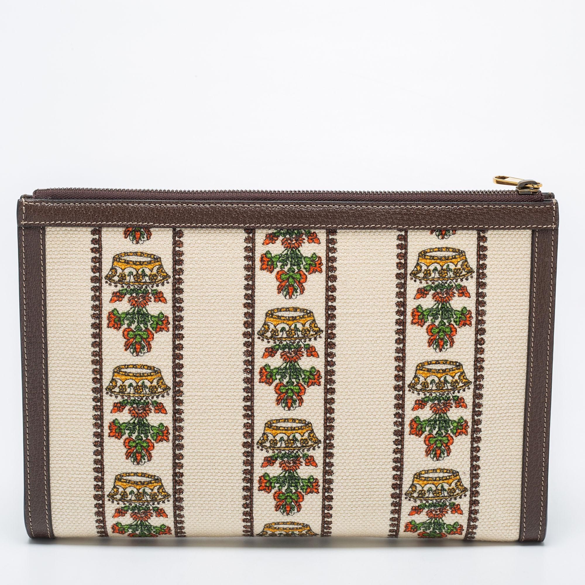From storing your travel toiletries to cosmetics, this 'Music is Mine' pouch from Gucci deems super helpful. The cream-brown canvas and leather exterior give away luxurious feels, while the gold-toned hardware adds a polished touch. The top zipper