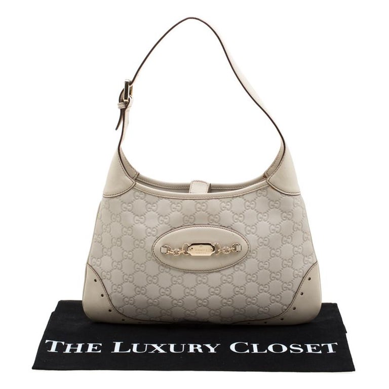 GUCCI PUNCH GUCCISSIMA IVORY LEATHER HOBO BAG - Still in fashion