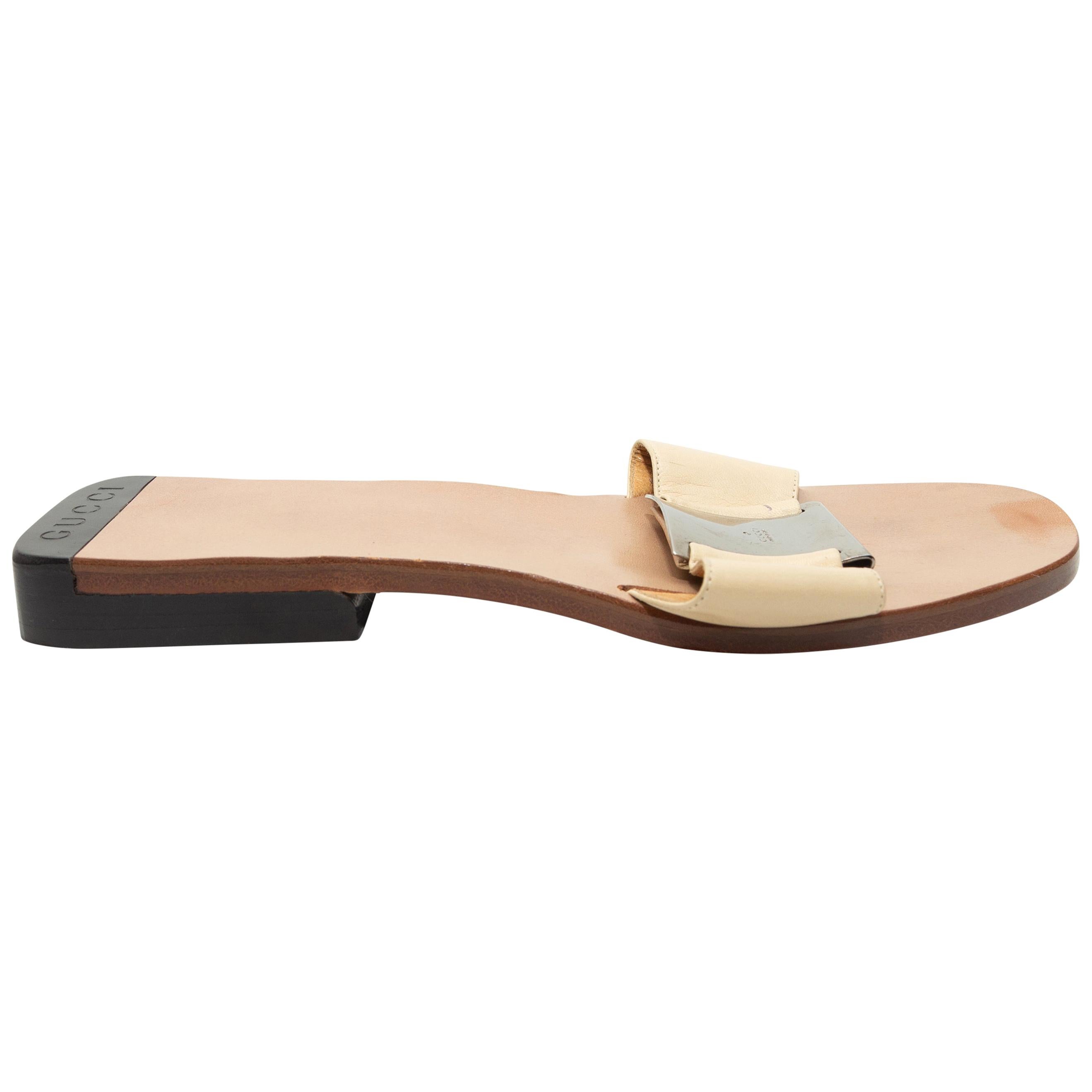 cream gucci slides