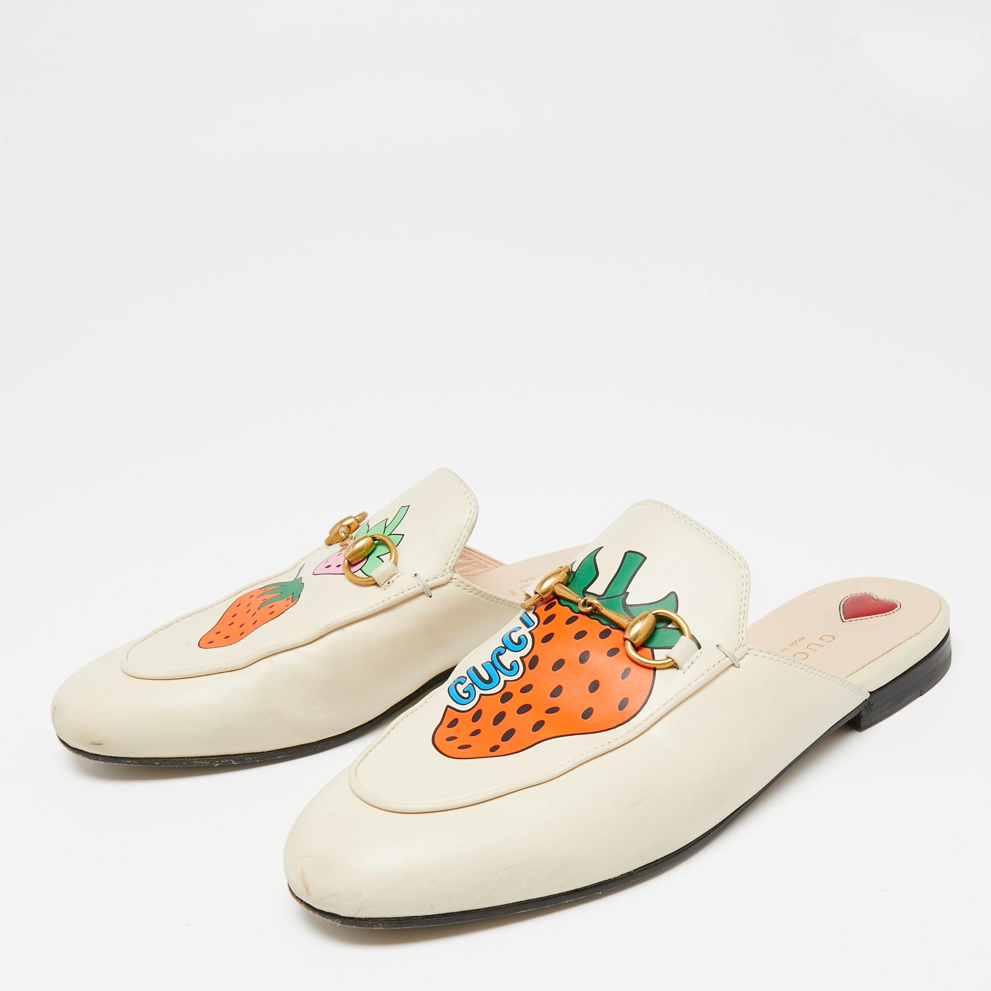 First introduced as part of Gucci's Fall Winter 2015 collection, the Princetown mules are an absolute favorite worldwide and have been worn by countless celebrities. These mules have been designed in leather and detailed with strawberry motifs and