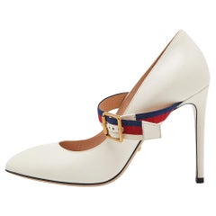 Gucci Sylvie Mary Jane Pumps aus cremefarbenem Leder Größe 38.5