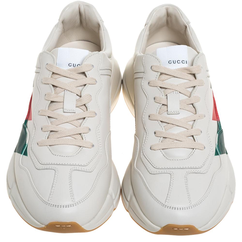 The time to feel trendy is now as Gucci brings you these superhit sneakers in cream. They are crafted from leather, detailed with lace-ups as well as signature accents, and are set on highly comfortable platforms. You are sure to receive nods of