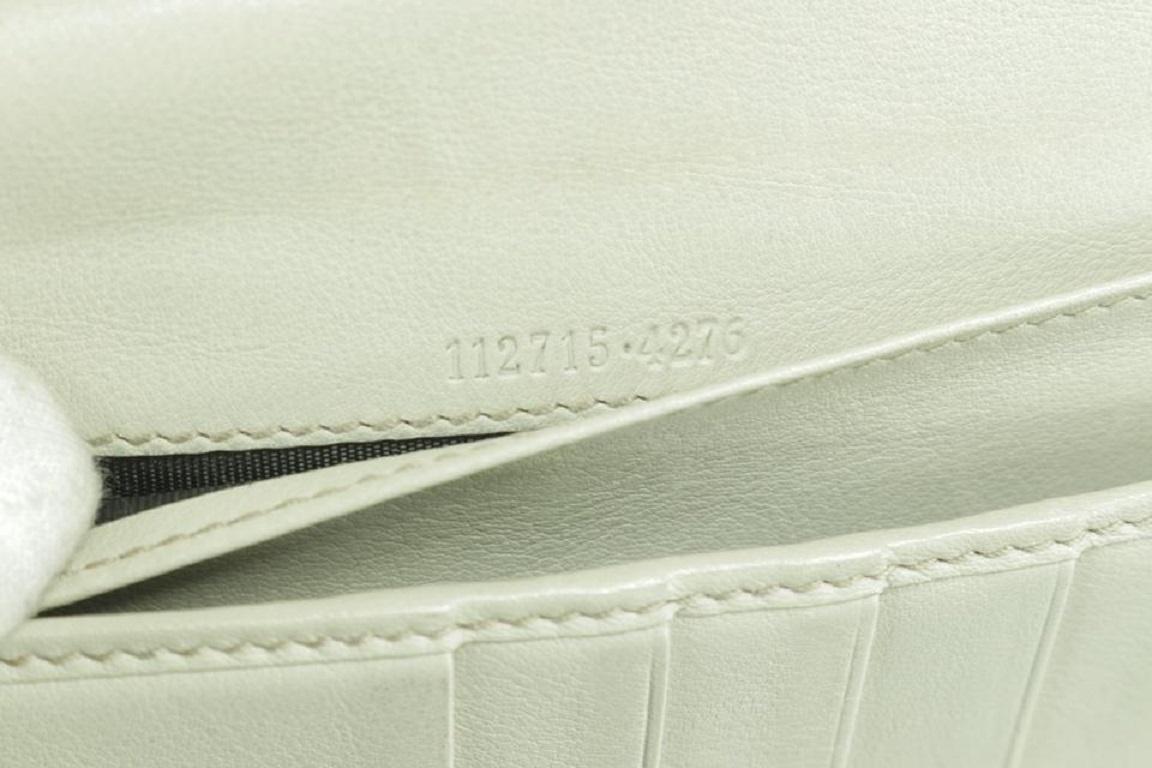 Gucci Cream Long 41gk0110 Ivory Guccissima Leather Bifold Wallet In Good Condition In Dix hills, NY