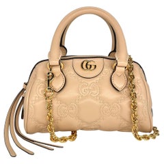 Gucci Cream MatelassÃ© Calfskin Leather GG Small Crossbody Shoulder Bag, 2023.