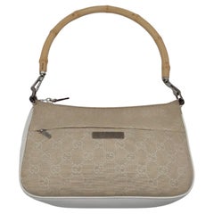 Borsa a tracolla Gucci con manico in bambù Monogram color crema