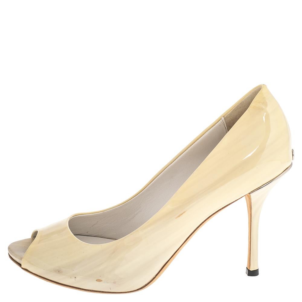 There are some shoes that stand the test of time and fashion cycles, these timeless Gucci pumps are the one. Crafted from patent leather in a cream shade, they are designed with sleek cuts, peep-toes, and sturdy heels.

Includes: Original Dustbag