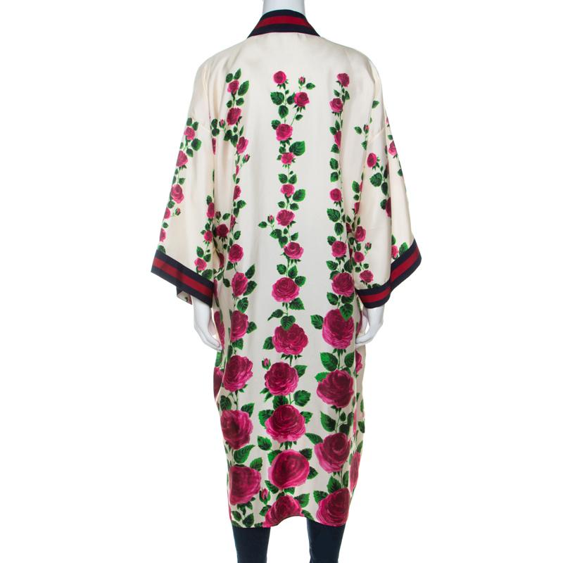 There's nothing that we don't love about this Gucci kimono! From the lovely rose garden print to the signature web trims, this creation impresses us like no other. It flaunts an open front and relaxed sleeves. Designed in Gucci's fun-spirited vibe