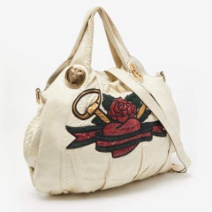 Hysteria Edition di Gucci in pitone crema grande e tatuaggio