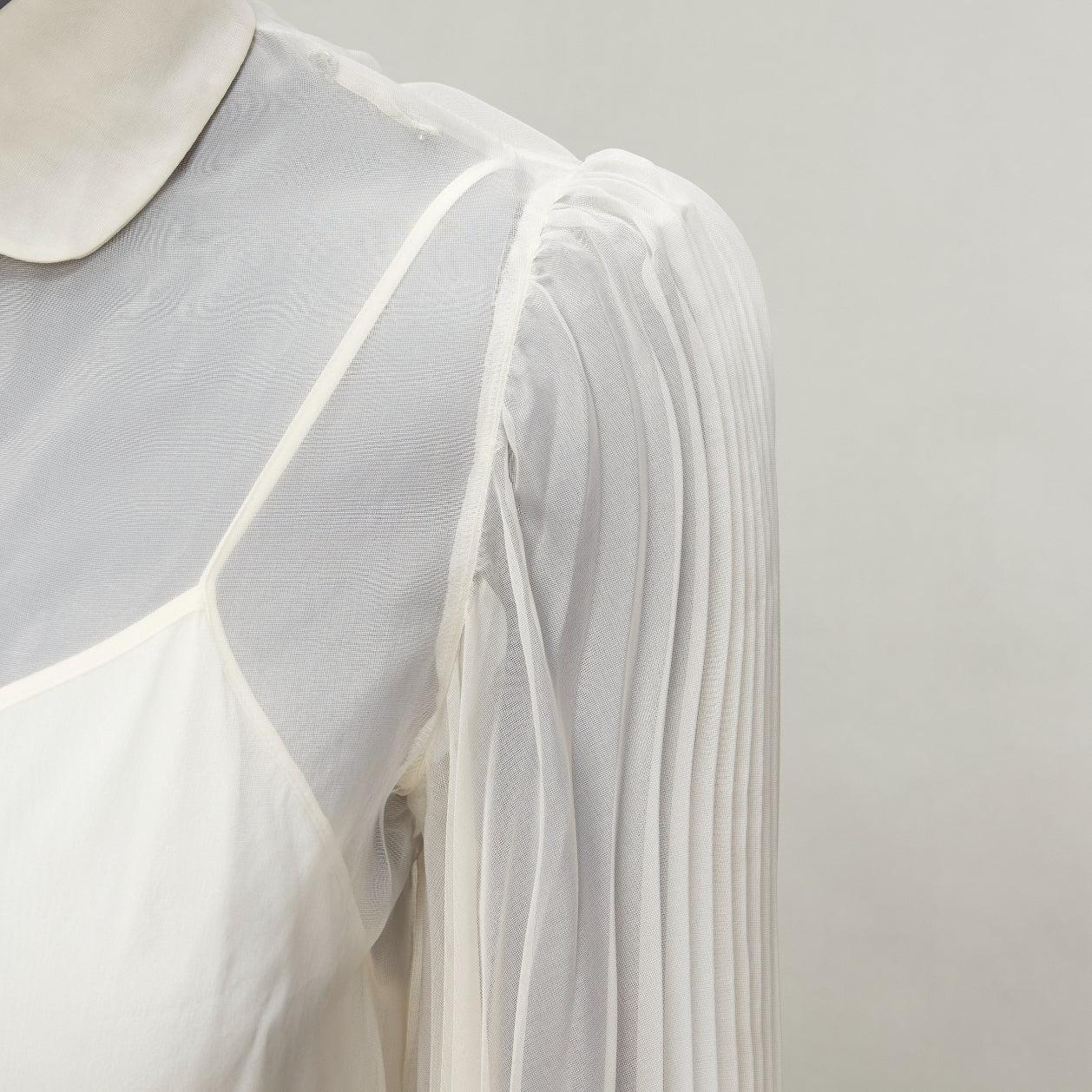 GUCCI cream silk blend puff sleeve Peter Pan collar cami lined blouse  IT38 XS
Reference: AAWC/A01143
Brand: Gucci
Designer: Alessandro Michele
Model: 621204 ZHM35 9303
Material: Silk, Blend
Color: Cream
Pattern: Solid
Closure: Button
Lining: Cream