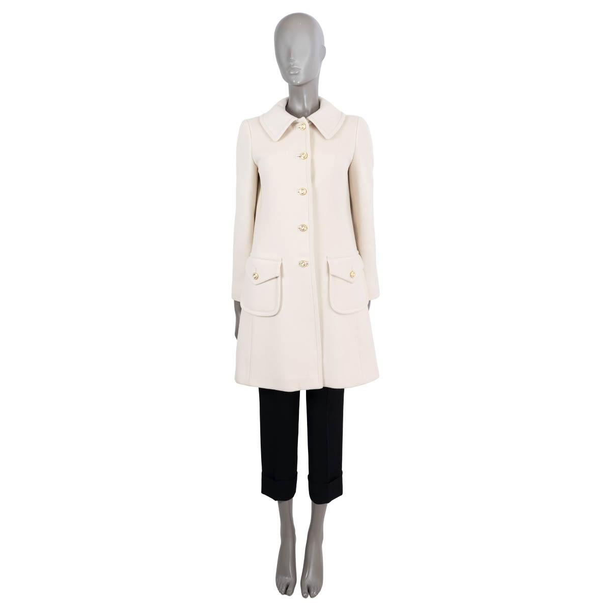 100% authentic Gucci coat in cream wool (100%). Featuring gold-tone GG buttons and two flap patch pockets. Lined in viscose (100%). Has been carried and is in excellent condition.

2020 Fall/Winter 

Measurements
Model	626300 ZHW03 1000
Tag