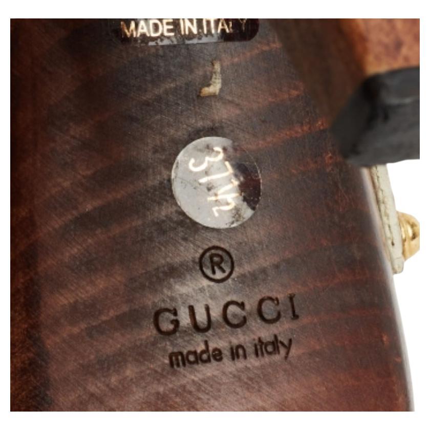 Anything but ordinary, these beige sandals from Gucci are here to impress you and make you fall in love with them. They are crafted from croc-embossed leather and feature an open-toe silhouette. They flaunt crisscross vamp straps and buckled ankle