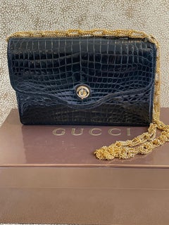 Gucci Crocodile Chain And Turn Lock Clutch  1960s