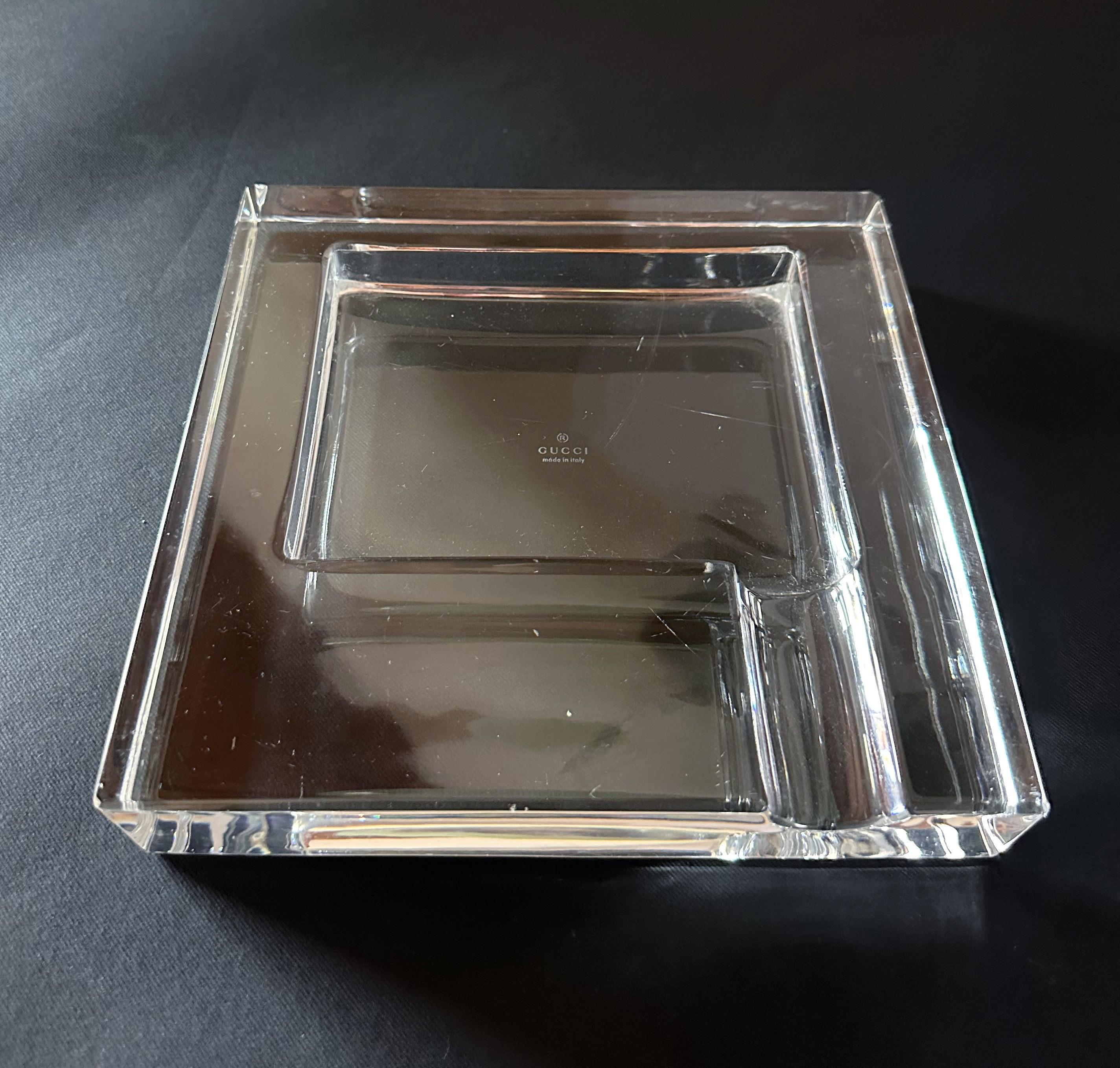 Thick and heavy clear crystal cigar ashtray by Gucci / Made in Italy in 1990s
Measures: width 8 inches, depth 8 inches, height 1.5 inches
1 available in stock in Italy
* please note the minor hairline scratch at the bottom
Order Reference #: