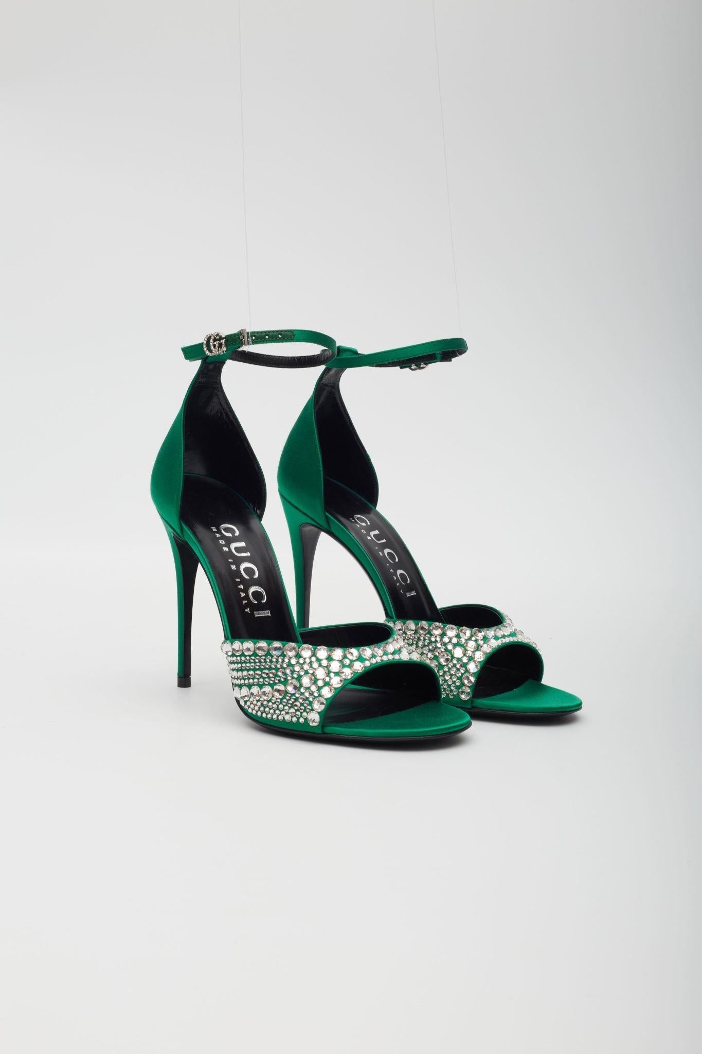 GUCCI CRYSTAL EMBELLISHED SATIN EMERALD 100 HEELS

Color: Emerald green
Material: Saint
Model No. 749832

EU 38
Heel Height: 100 mm / 4”
Condition: Excellent. Like new
Comes with: Dust bag and shoe box

Made in Italy
