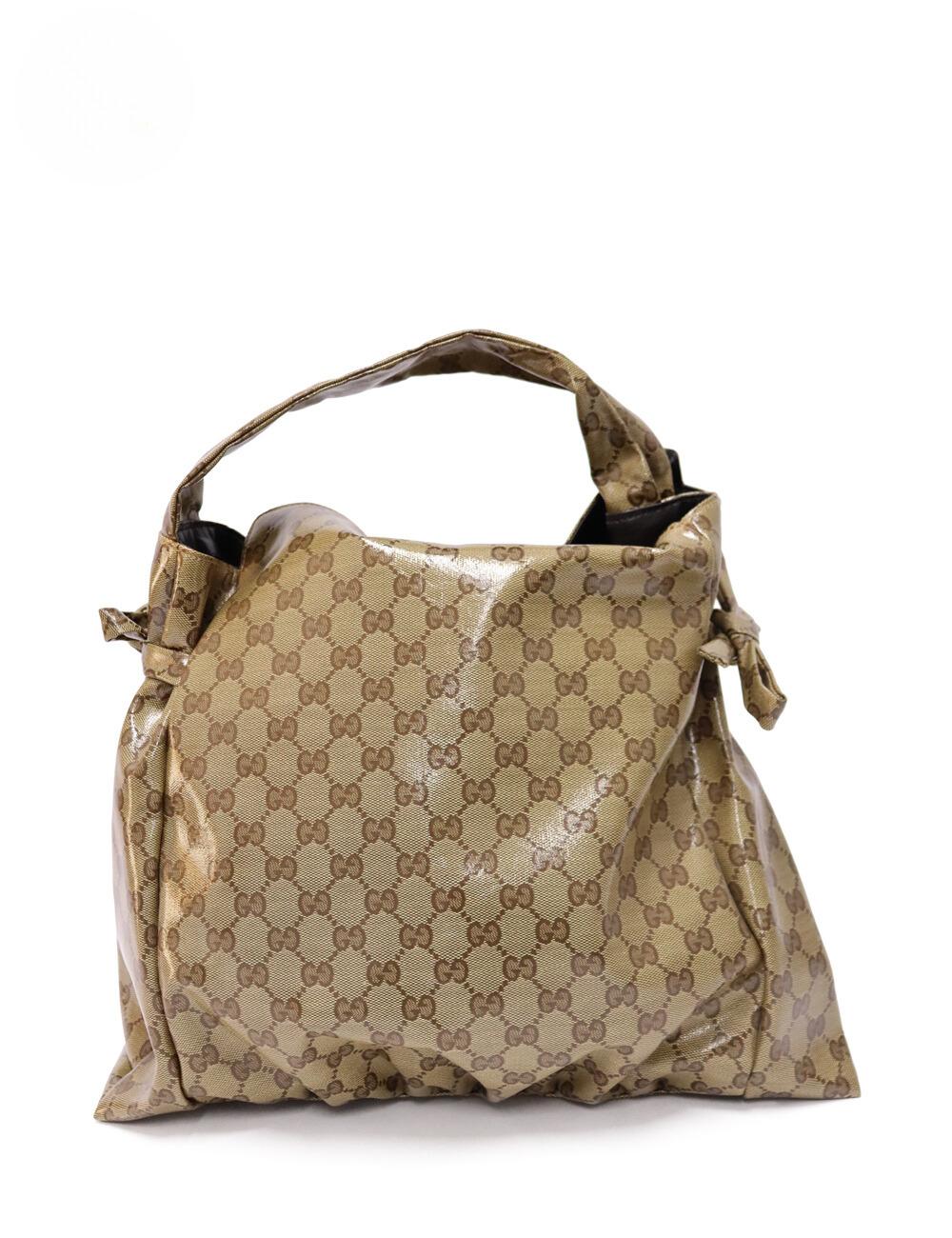 Gucci Crystal Hysteria Medium Hobo Handbag, it features signature glossy 'GG' printed logo canvas, one interior zip pocket and two slip pockets.

Material: Leather.
Hardware: Gold.
Height: 37cm
Width: 38cm
Depth: 15cm
Handle Drop: 8cm
Overall