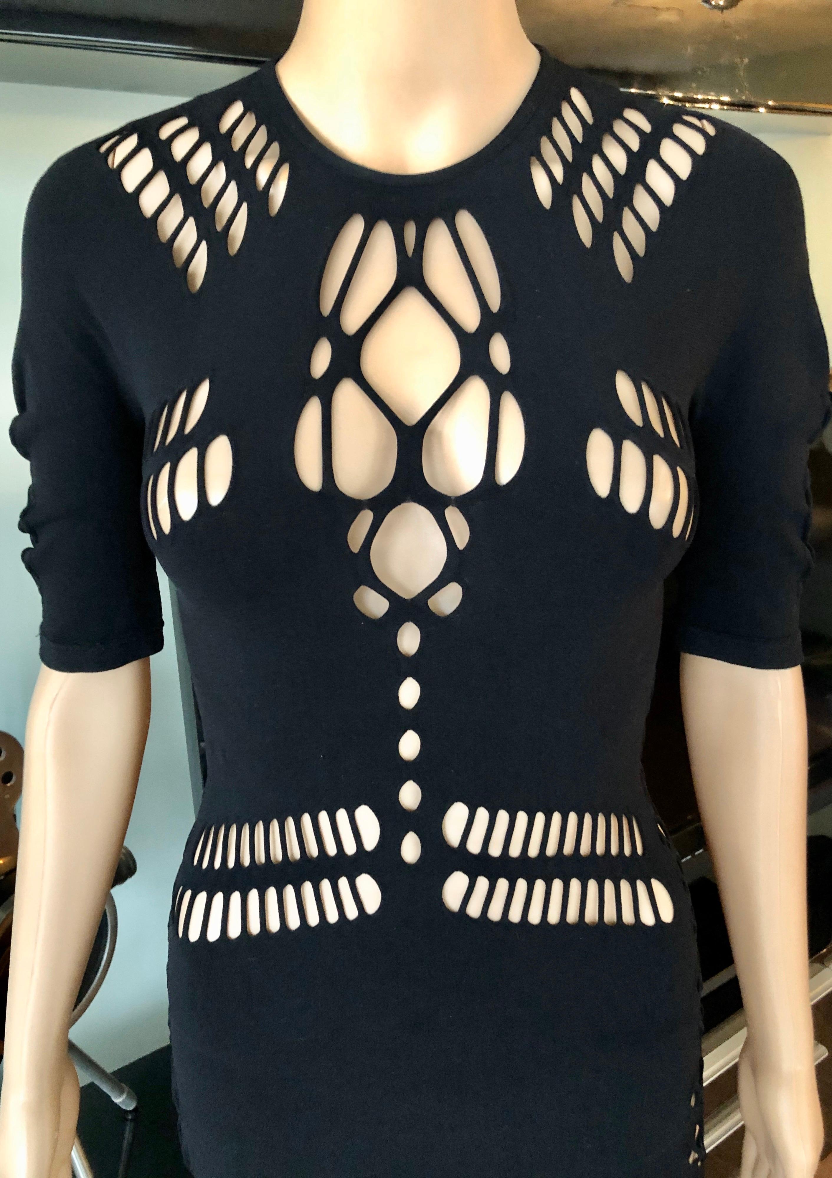 Gucci Cutout Fishnet Mesh Black Top S/M

Please note size and fabric tags are missing. Please find the approximate measurements below:
Chest: 13-20