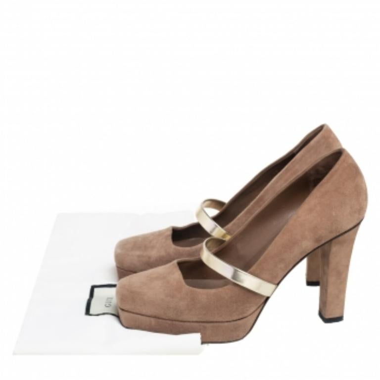 Comfortable, chic yet bold, these Gucci Mary Jane pumps deserve a place in your collection immediately. It features a beige suede body and is set on block heels. It comes with a strap across the vamps, a square front and sturdy soles.