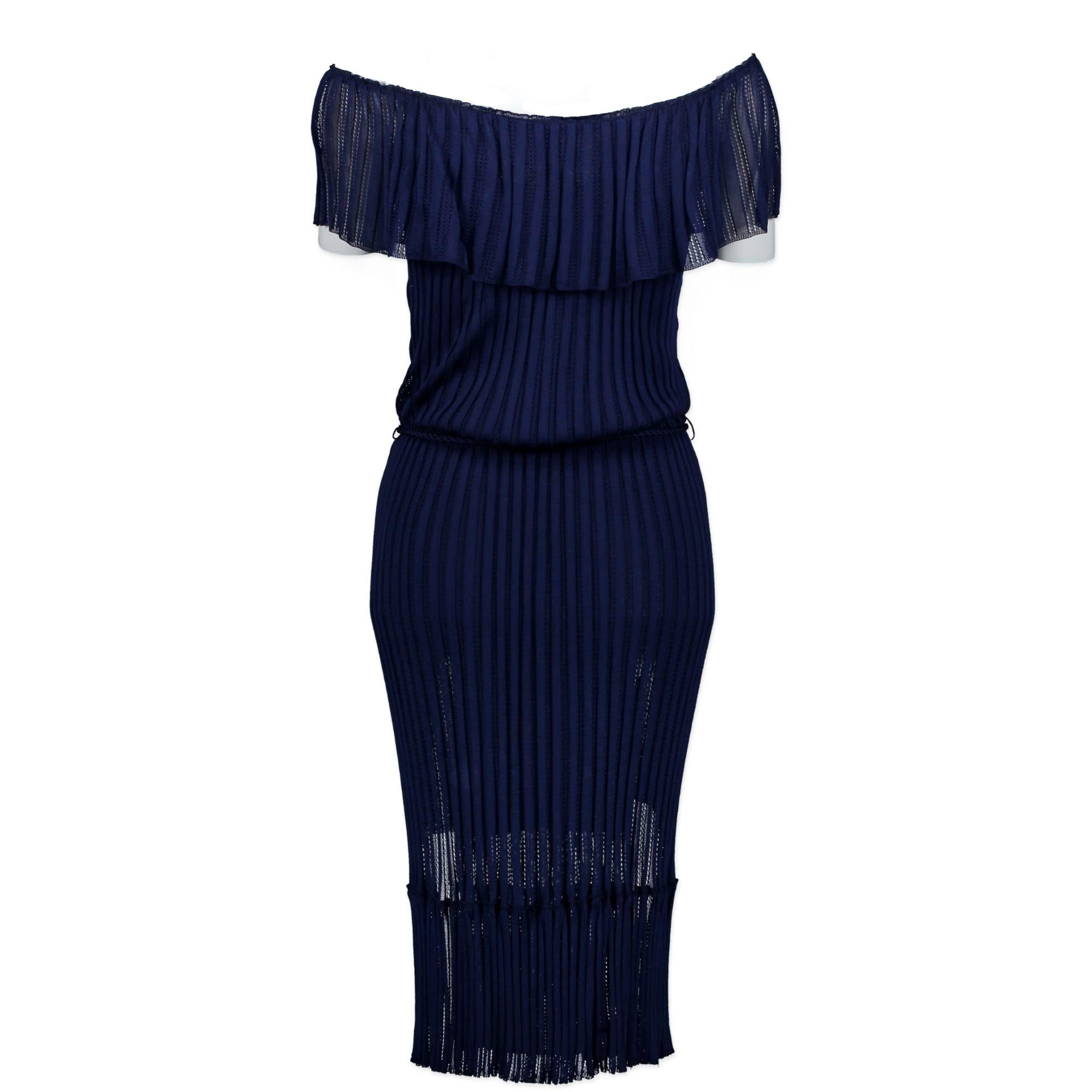 In excellent condition.

Gucci Dark Blue Knit Dress - Size XS

This dark blue off shoulder dress is perfect as a beach dress. Style this dress with some sandals, slippers or some wedges and your ready to go. The belt with tassels and a wooden