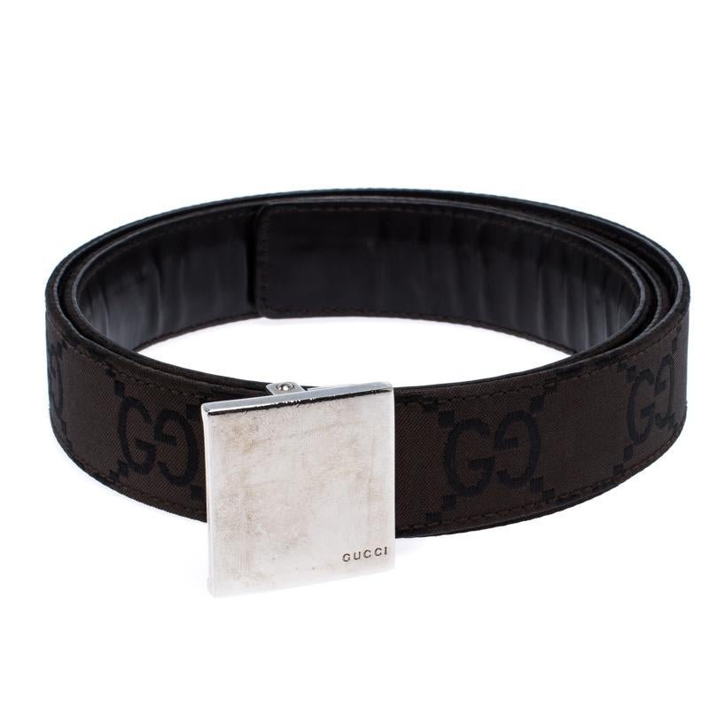 Add a luxe twist to your attire with this belt from Gucci. Made from GG fabric, this dark brown belt comes with a complementing silver-tone logo plaque. It is durable and high in style.

Includes: The Luxury Closet Packaging

