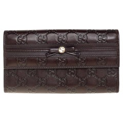 Gucci Dark Brown Guccissima Leather Mayfair Bow Continental Flap Wallet