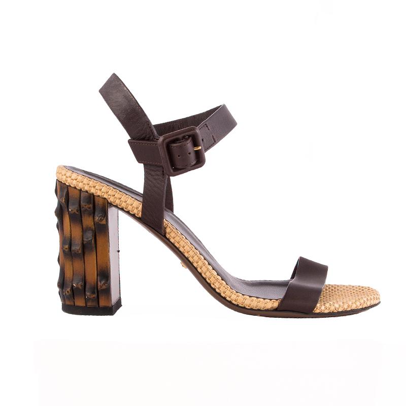 100% authentic Gucci bamboo heel sandals in dark brown leather with beige raffia sole. Close with buckle on the side. Have been worn and are in excellent condition. 

Measurements
Imprinted Size	35
Shoe Size	35
Inside Sole	22.5cm (8.8in)
Width	7cm